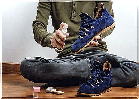 Man cleaning shoes