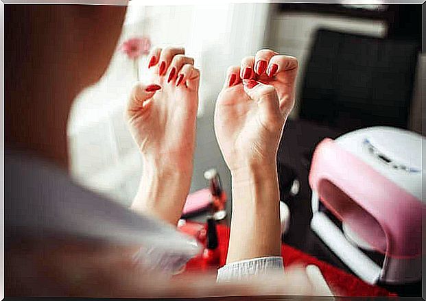 Red manicure.