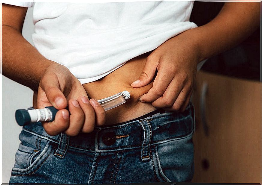 Child taking insulin