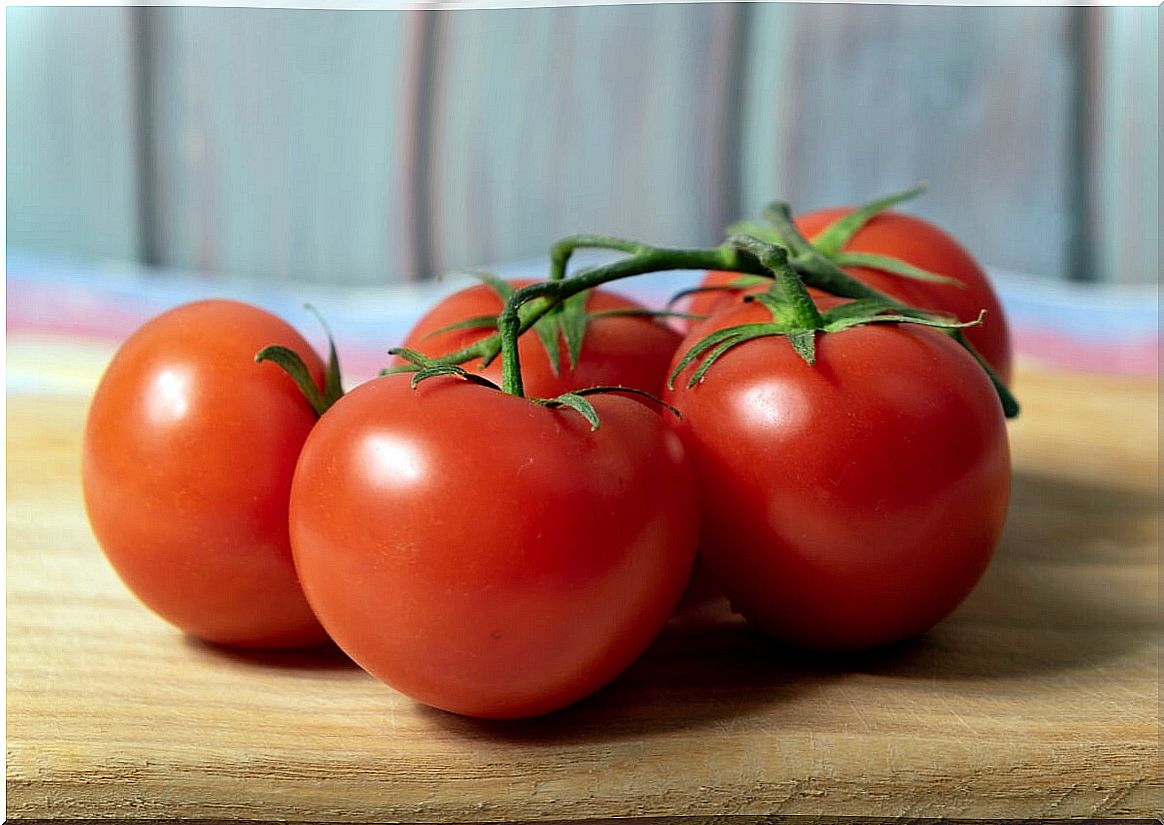 Tomatoes on table.