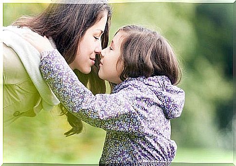 Little girl hugging her mother