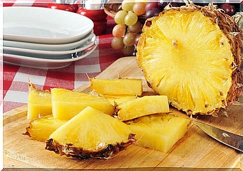 Chopped pineapple on a cutting board