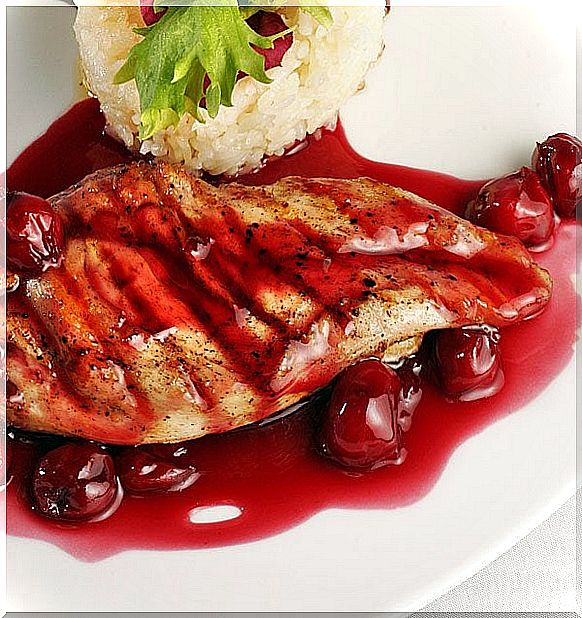 Aromatic baked chicken with cherry sauce