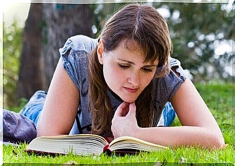 Woman lying down reading