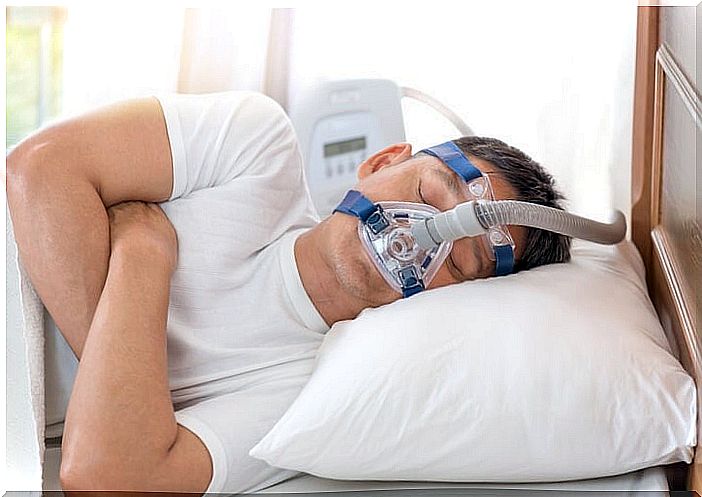 Sleeping man with mask.